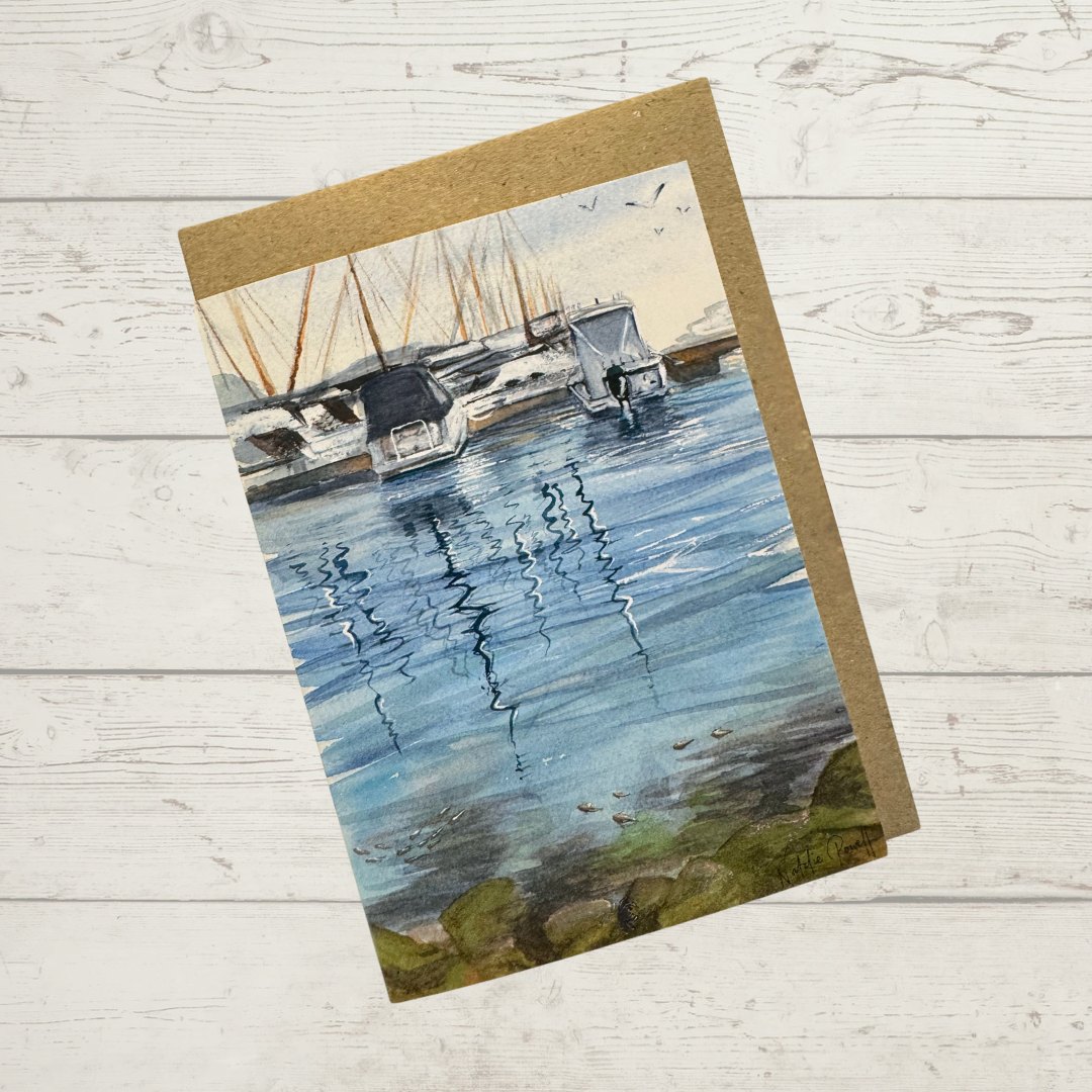 Image of actual card with natural kraft paper envelope. Image depicts boats moored at Mindarie Marina, Perth Western Australia.