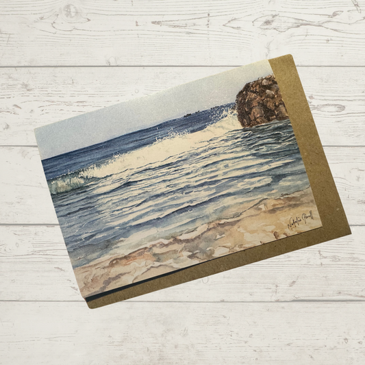 Image of actual card with natural coloured kraft paper envelope. Image depicts morning light on the water next to the groyne at Burns Beach, Perth Western Australia.