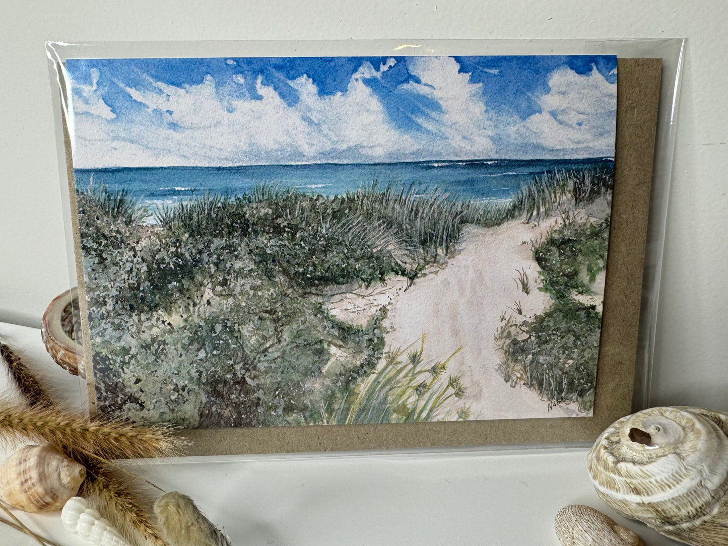 'Iluka Beach' greeting card in cellophane envelope.