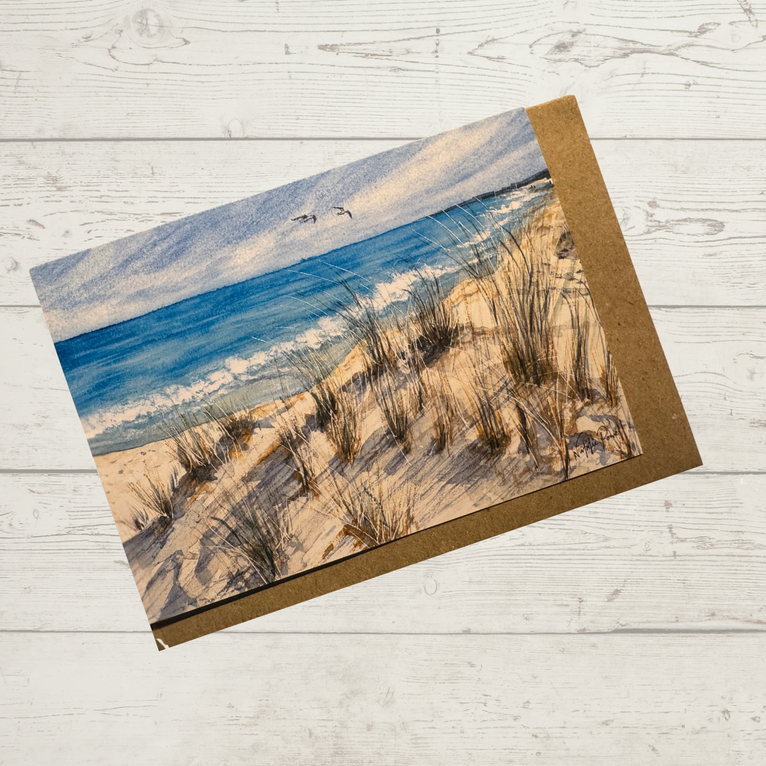 Image of actual card with natural coloured kraft paper envelope. Image depicts a grassy dune with morning shadows by Mullaloo Beach, Perth Western Australia.